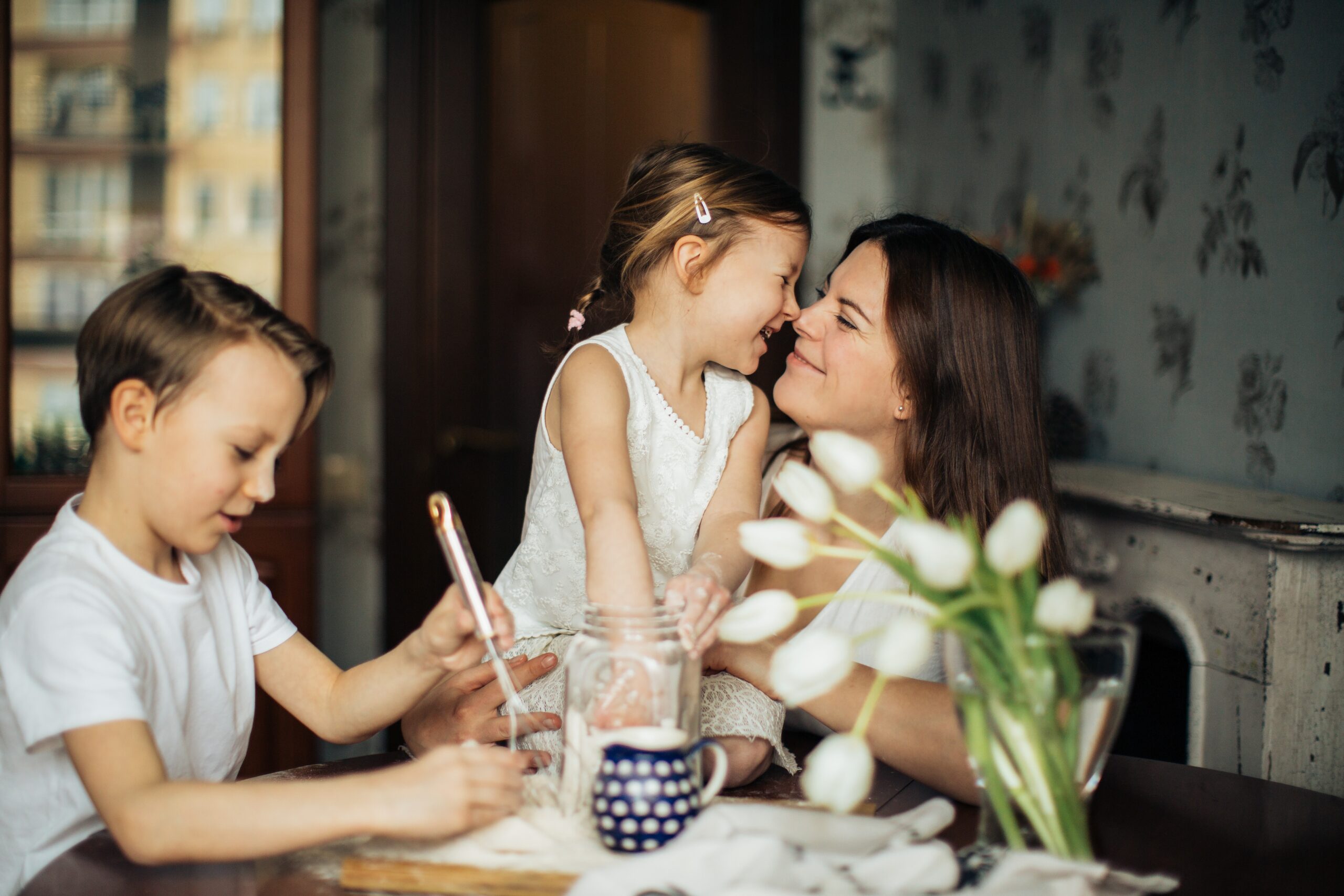 photo-of-woman-playing-with-her-children-3806953